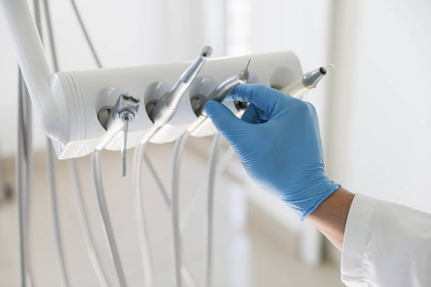 Professional Tooth Extraction technician working in Trowbridge Park, MI